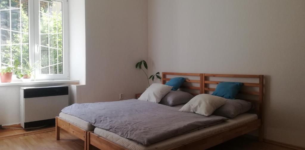 Postel nebo postele na pokoji v ubytování Apartment Black Field