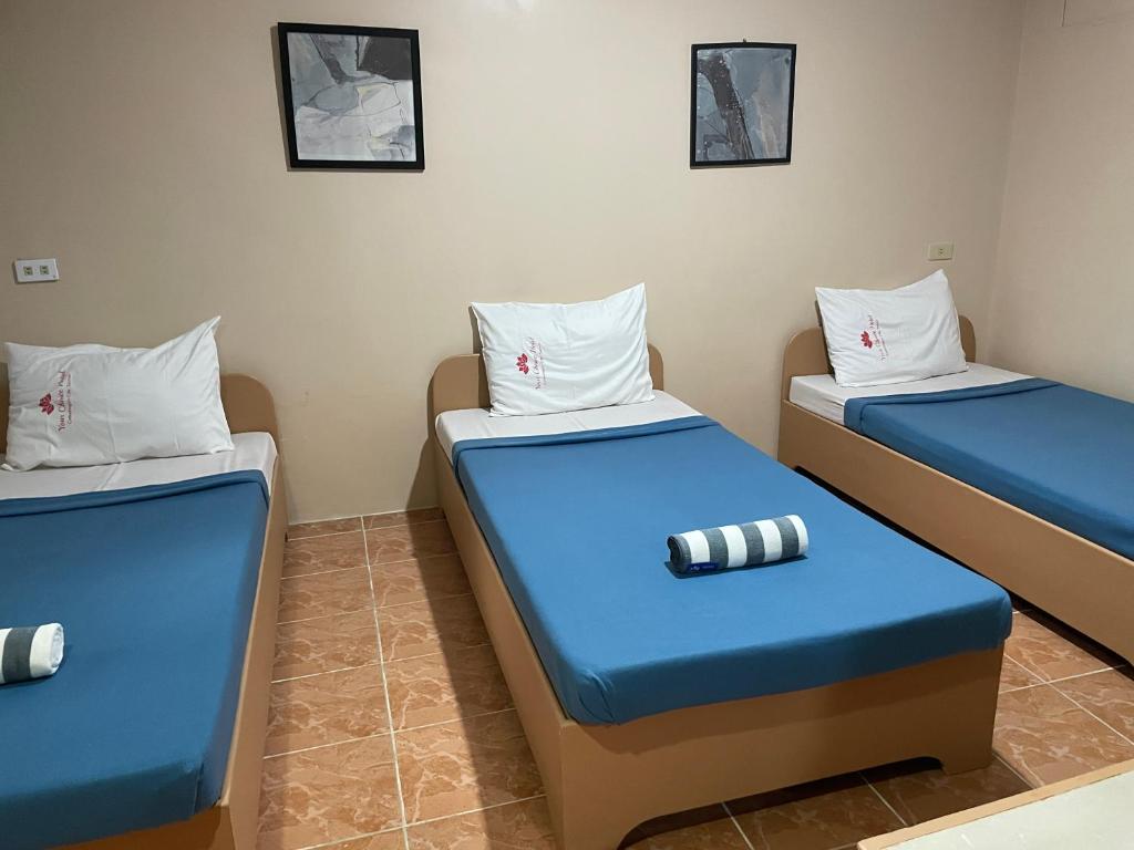 Postel nebo postele na pokoji v ubytování Your Choice Hotel