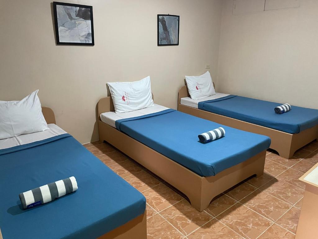 Postel nebo postele na pokoji v ubytování Your Choice Hotel