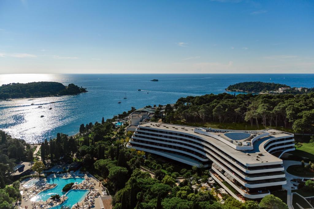 a building next to a body of water at Lone Hotel by Maistra Collection in Rovinj