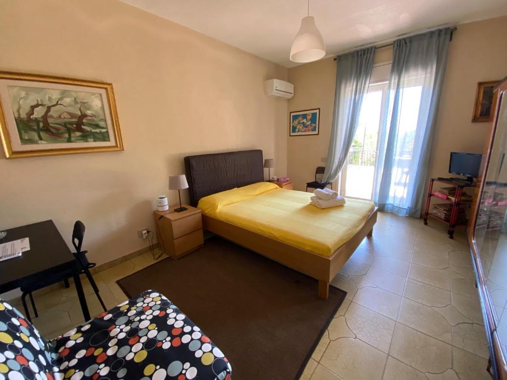 Postel nebo postele na pokoji v ubytování Terra Di Mare
