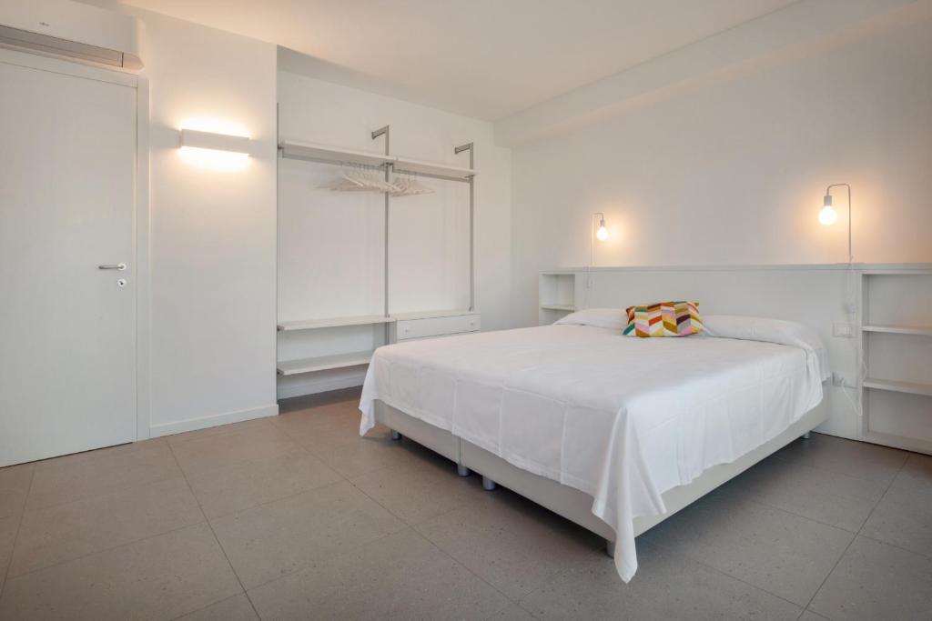 Posteľ alebo postele v izbe v ubytovaní Apartment Azzurro