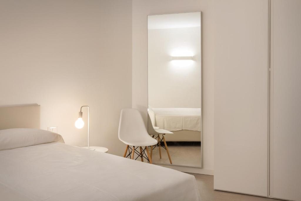 Posteľ alebo postele v izbe v ubytovaní Apartment Azzurro