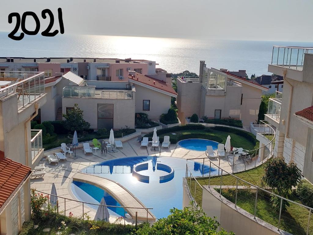 a view of a swimming pool from a building at Fantastic Sea View Sun village Byala in Byala