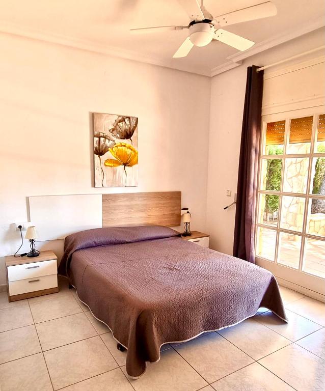Posteľ alebo postele v izbe v ubytovaní Villa Bella Cala