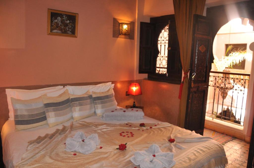 Postel nebo postele na pokoji v ubytování Riad des Etoiles