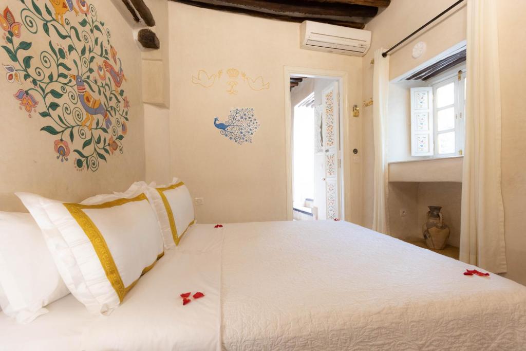 Postel nebo postele na pokoji v ubytování Riad Palais Des Princesses & Spa
