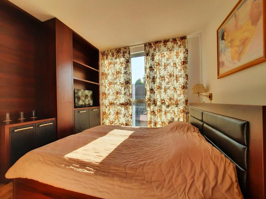 Postel nebo postele na pokoji v ubytování Hotel City Pleven