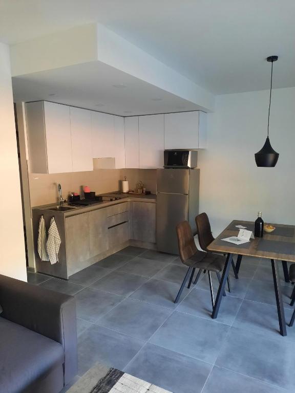Kuchyň nebo kuchyňský kout v ubytování Apartmani Nerium