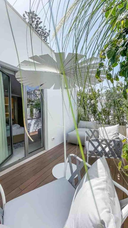 A seating area at Ognissanti Restaurant Spa Hotel Rooftop