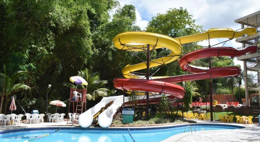 A piscina localizada em GOLDEN DOLPHIN Resort - Grand & Express - Caldas Novas - COM TV A CABO - Aguas Termais ou nos arredores