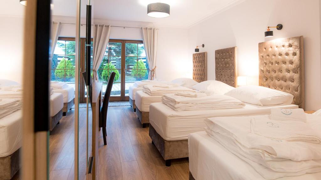 Apartamenty Kapitańskie - Vierpersoonskamer Met Uitzicht Op De Tuin