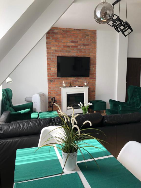 Posedenie v ubytovaní Apartament Zielone Fotele Starówka