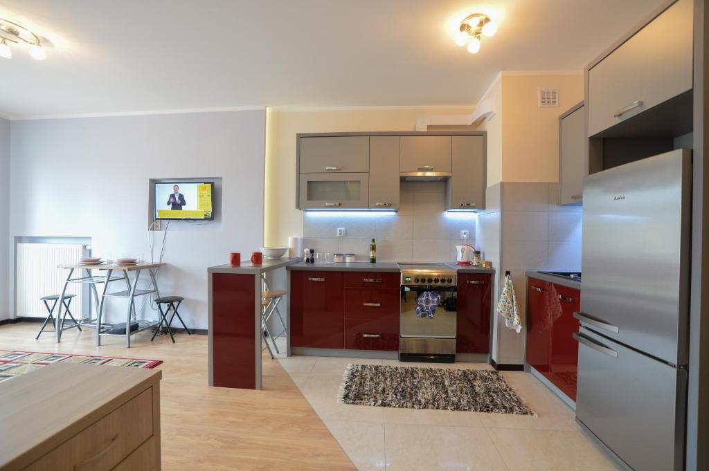 Kuchyňa alebo kuchynka v ubytovaní Słoneczny Apartament