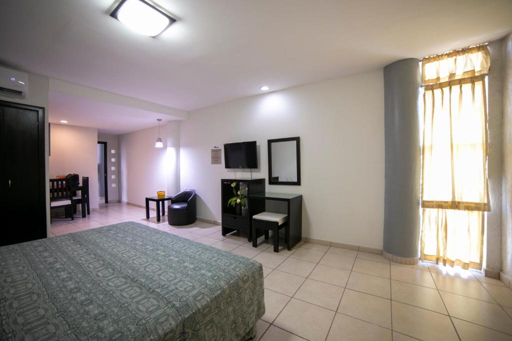 TV a/nebo společenská místnost v ubytování Hotel RS Suites