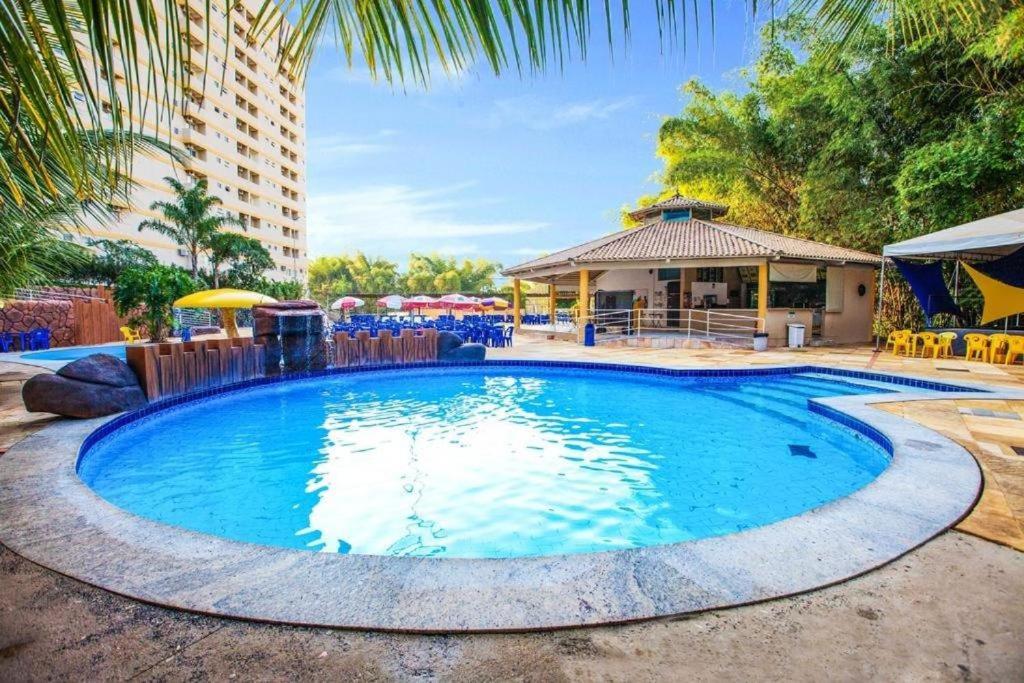 A piscina localizada em GOLDEN DOLPHIN Resort - Grand & Express - Caldas Novas - COM TV A CABO - Aguas Termais ou nos arredores