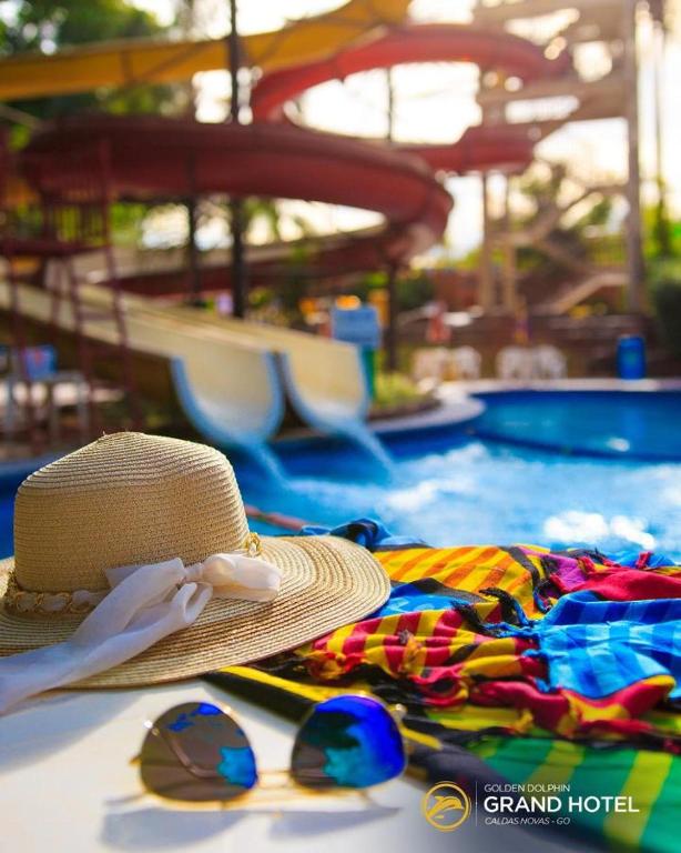 A piscina localizada em GOLDEN DOLPHIN Resort - Grand & Express - Caldas Novas - COM TV A CABO - Aguas Termais ou nos arredores