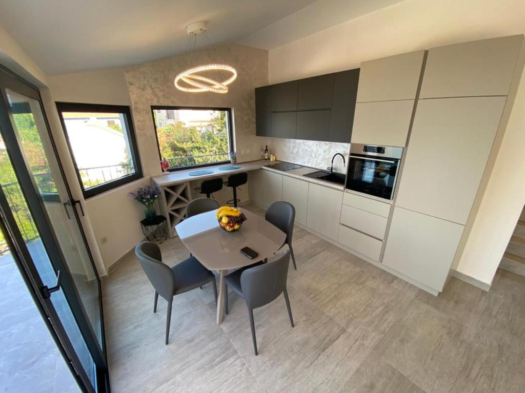 Η κουζίνα ή μικρή κουζίνα στο Martin Lux Apartment
