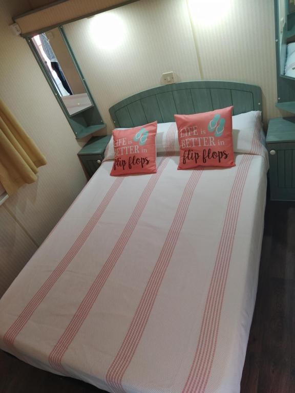 Postel nebo postele na pokoji v ubytování Residencial Robles