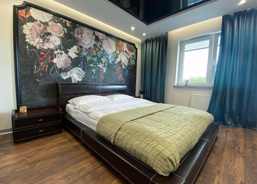 Posteľ alebo postele v izbe v ubytovaní Apartament Szot