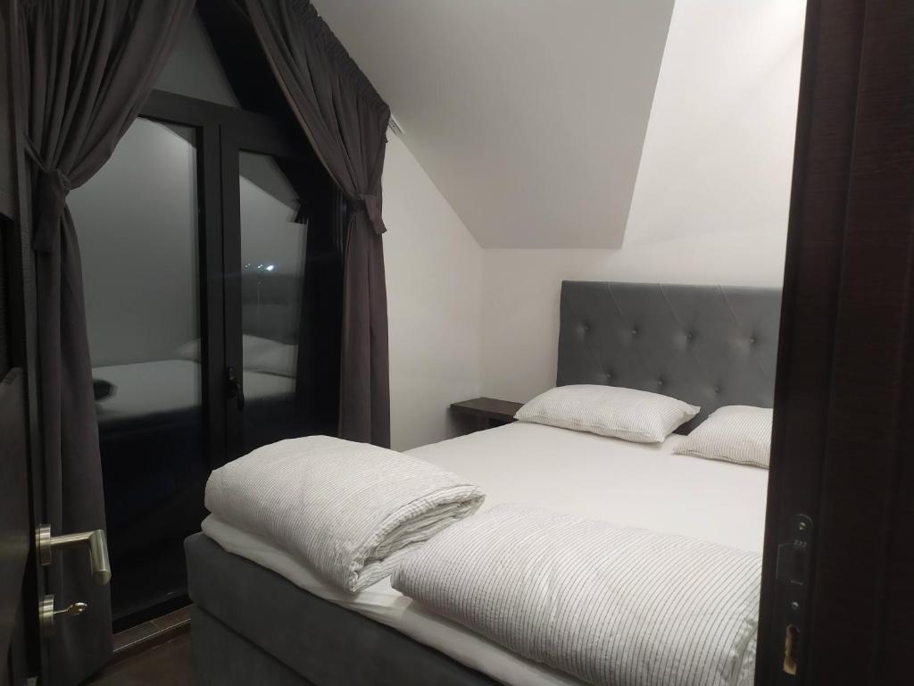 Postel nebo postele na pokoji v ubytování Diamond Sunrise