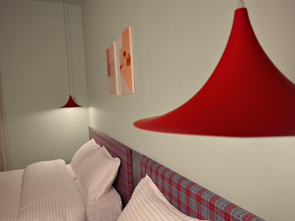 Postel nebo postele na pokoji v ubytování Green Rooms