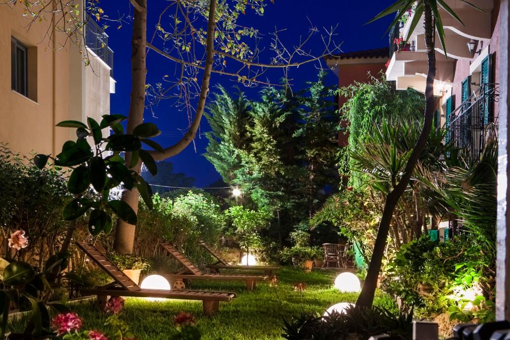 A garden outside Captain's House Hotel