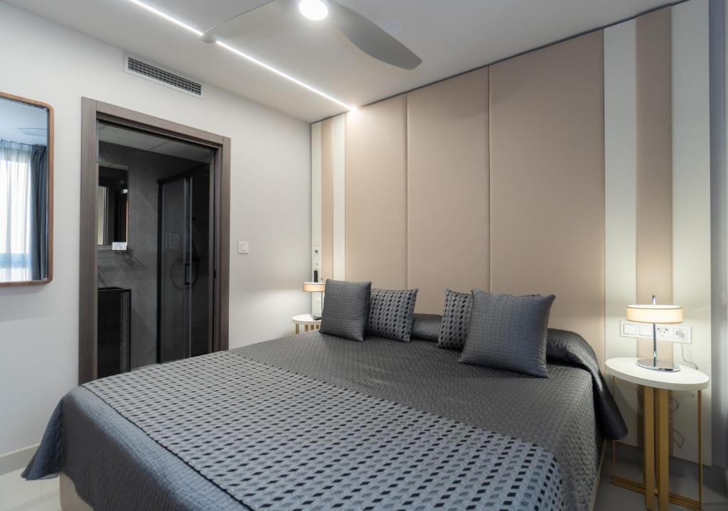 Postel nebo postele na pokoji v ubytování Hotel Perla del Sur