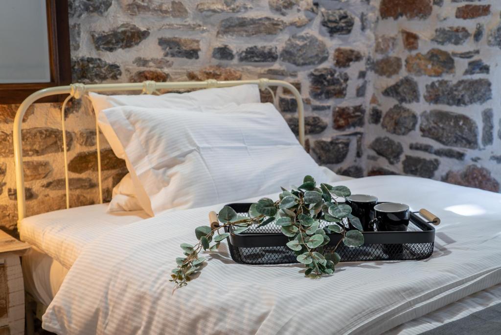 Łóżko lub łóżka w pokoju w obiekcie Helene Eco Luxury Villa