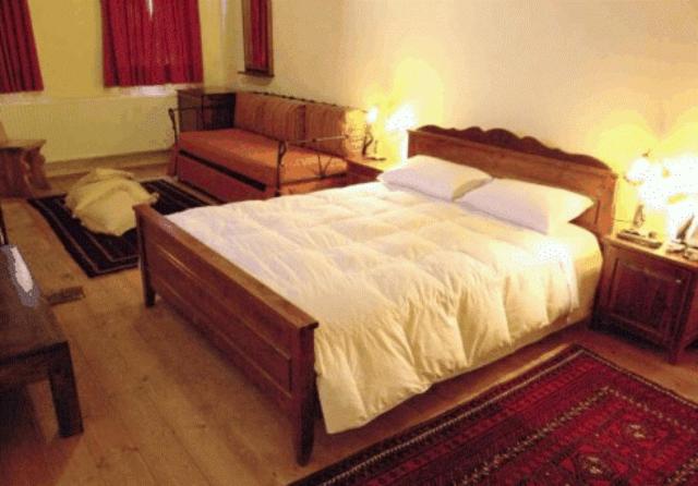 Postel nebo postele na pokoji v ubytování Nimbus Guesthouse