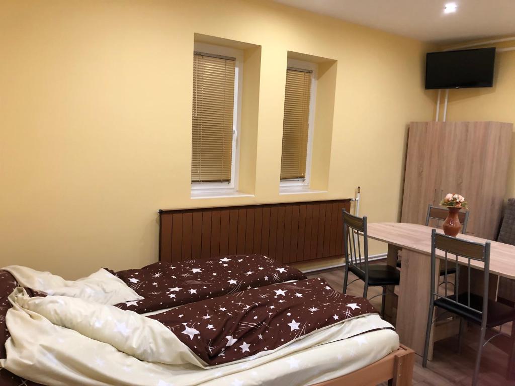 Postel nebo postele na pokoji v ubytování Relax Bogács