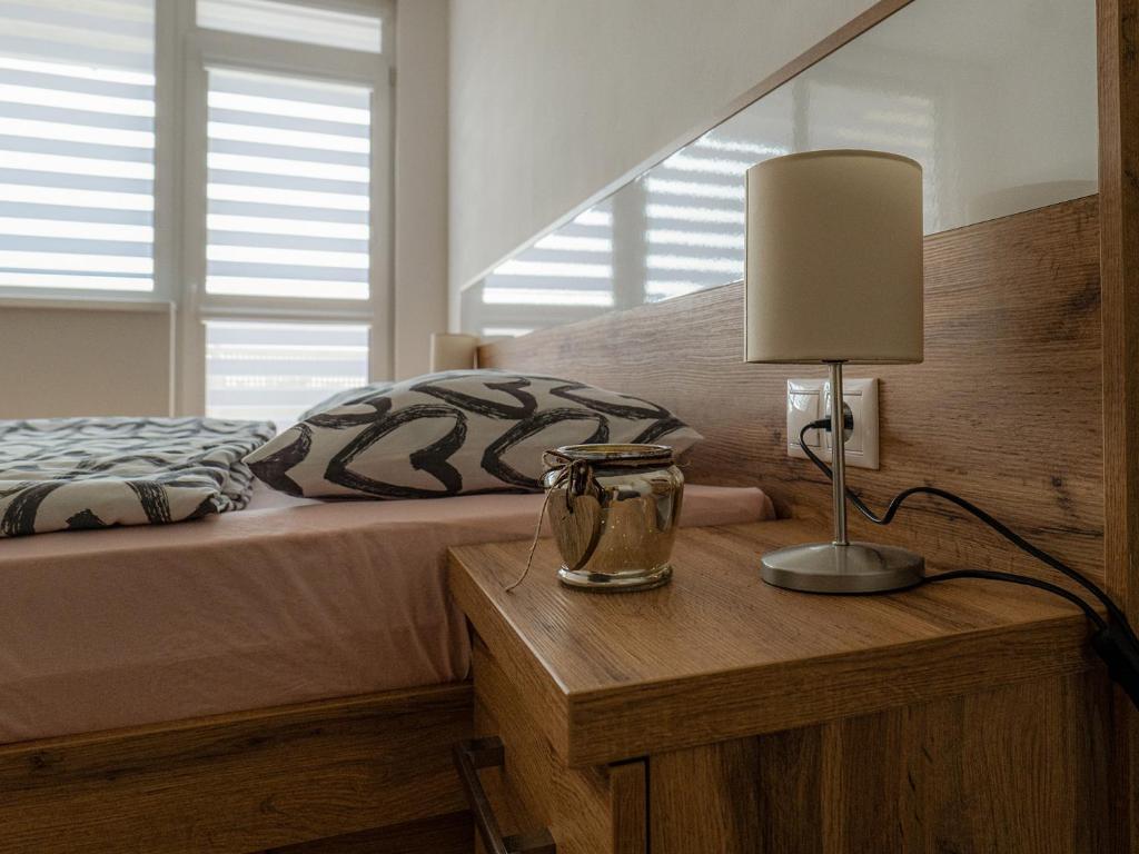 Postel nebo postele na pokoji v ubytování Apartmany Motocentrum