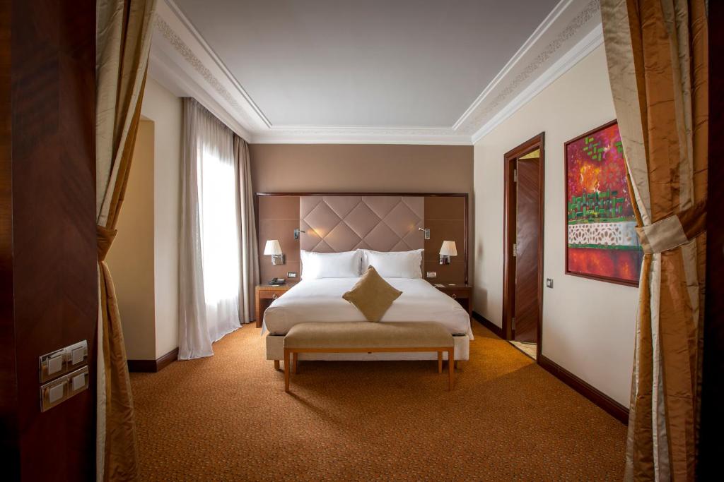 Postel nebo postele na pokoji v ubytování Hotel Atlantic Agdal