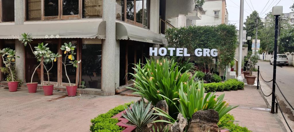 a hotel gpc sign in front of a building at Hotel GRG in Vadodara