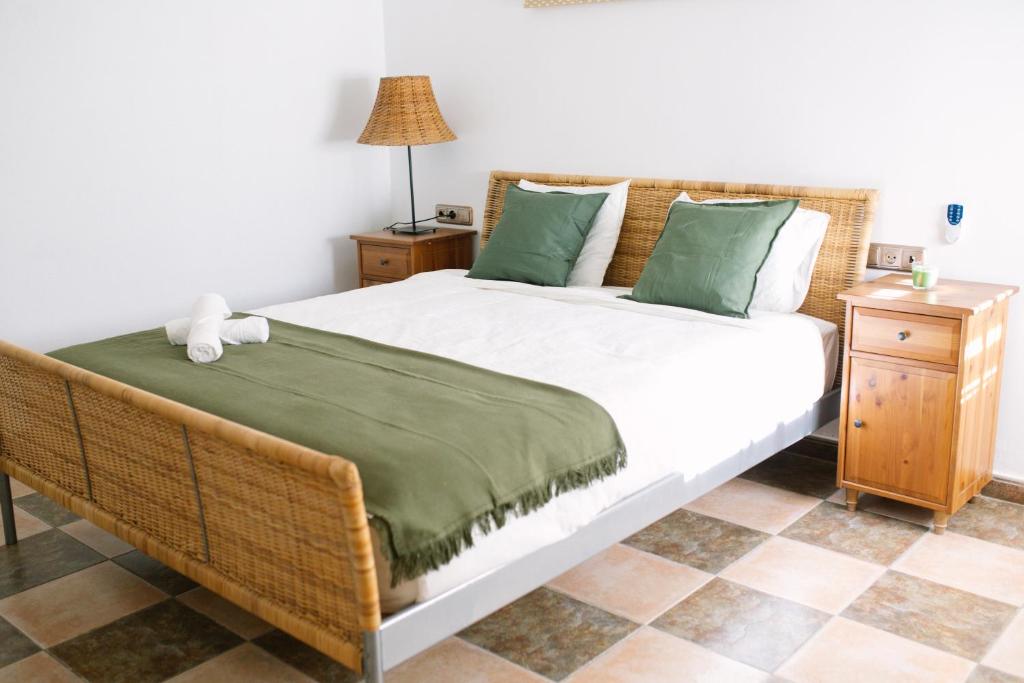 Posteľ alebo postele v izbe v ubytovaní Casa Luxury "El Olivo de Córdoba" con jacuzzi y parking privado