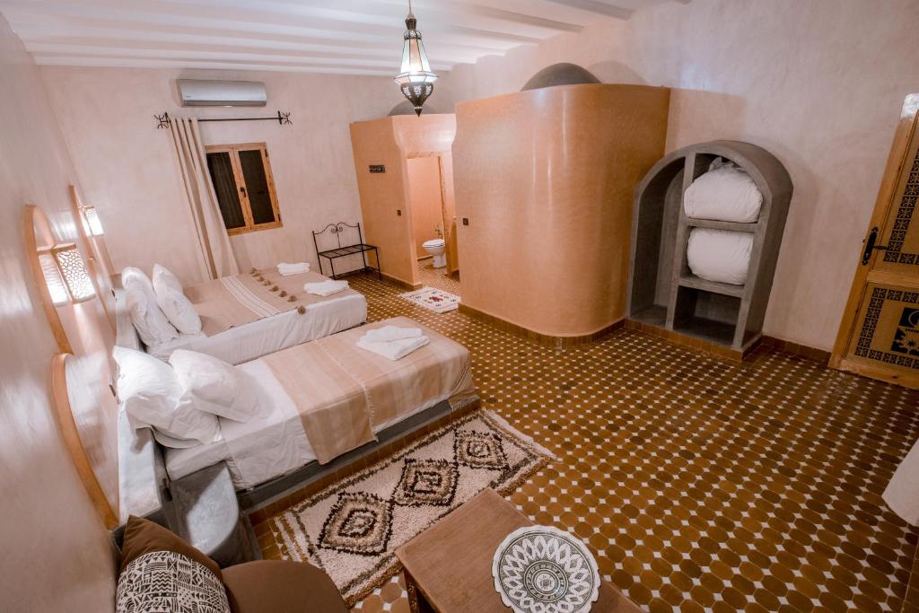 Postel nebo postele na pokoji v ubytování Hassilabiad Appart Hotel