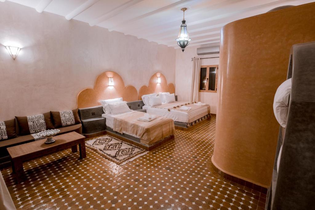 Posezení v ubytování Hassilabiad Appart Hotel