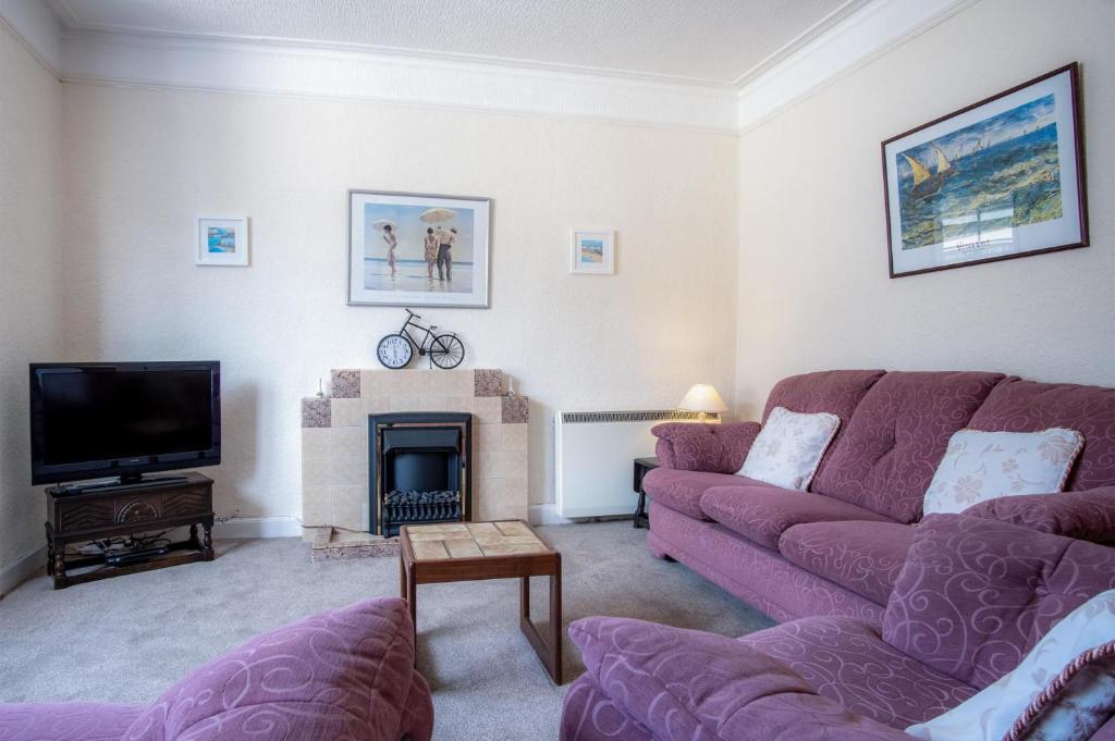 Posezení v ubytování Dragons Den - 2 Bedroom Apartment - Tenby