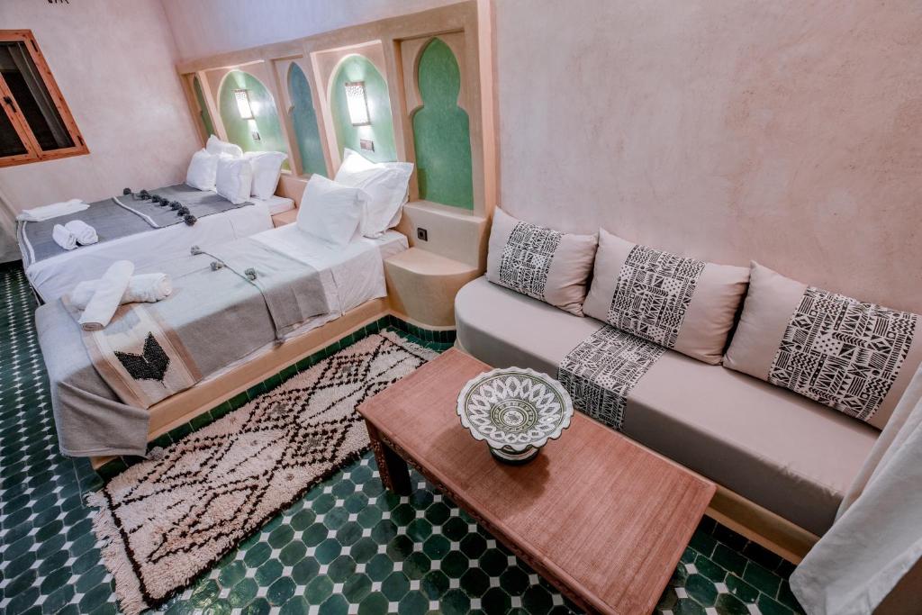 Posezení v ubytování Hassilabiad Appart Hotel