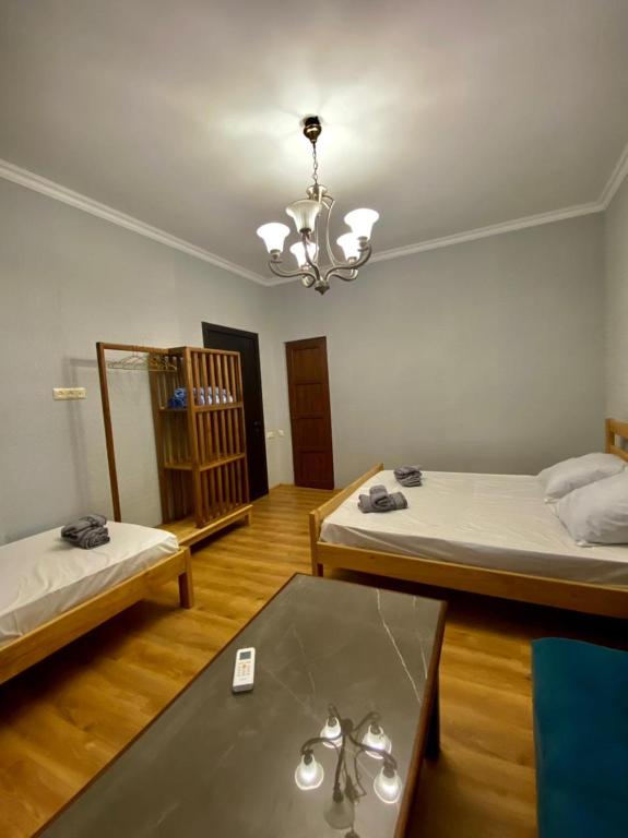 Llit o llits en una habitació de Guest House - Avlabari