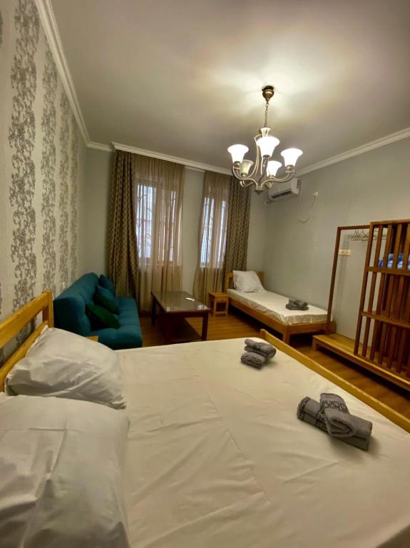 Llit o llits en una habitació de Guest House - Avlabari