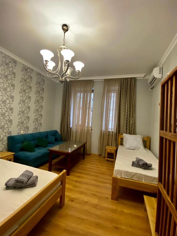 Llit o llits en una habitació de Guest House - Avlabari