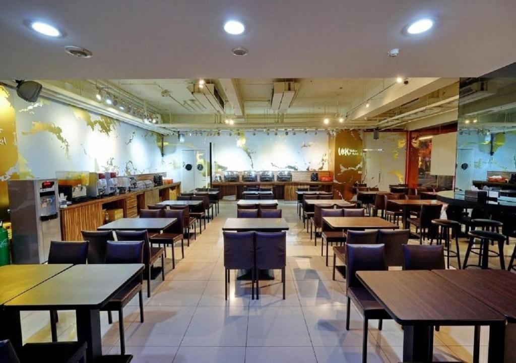 Restoran või mõni muu söögikoht majutusasutuses Walker Hotel - Sanchong