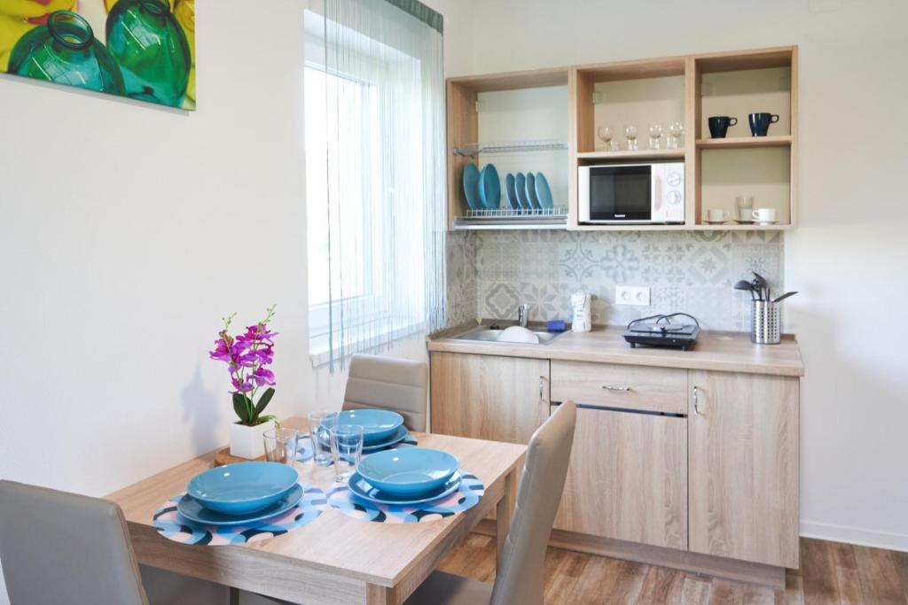 Kuchyň nebo kuchyňský kout v ubytování Thermal Apartman - EM
