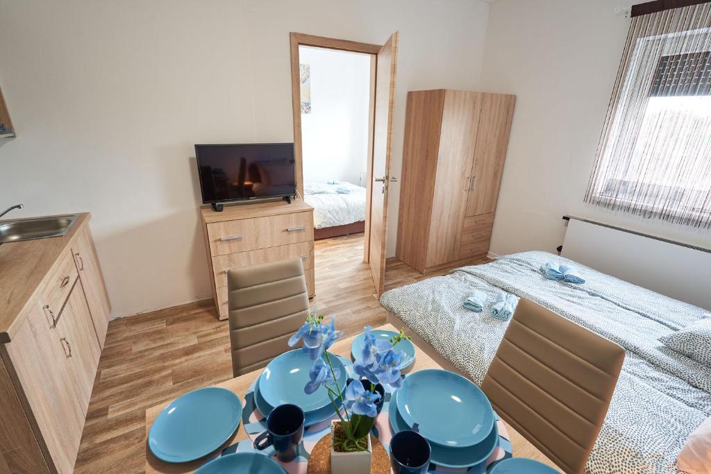Postel nebo postele na pokoji v ubytování Thermal Apartman - EM