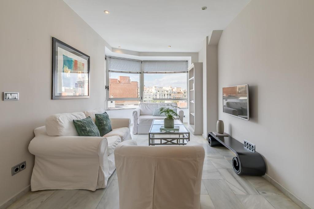 TV a/nebo společenská místnost v ubytování Madrid Rental Flats - Alquiler de Temporada