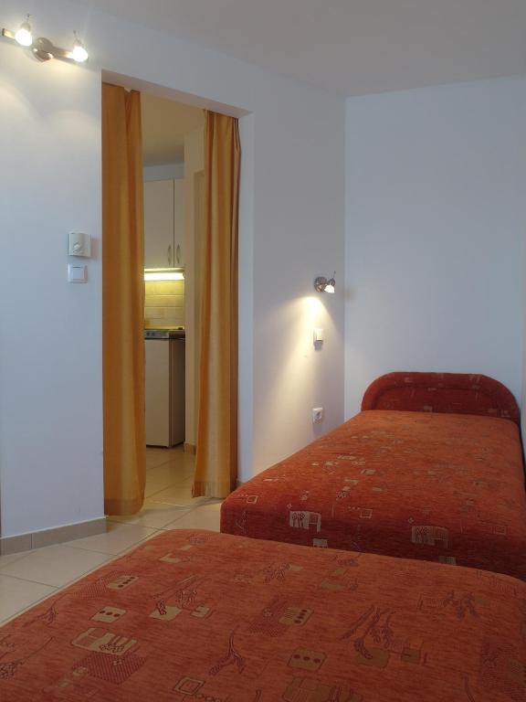 Posteľ alebo postele v izbe v ubytovaní Tip-Top Apartmenthouse