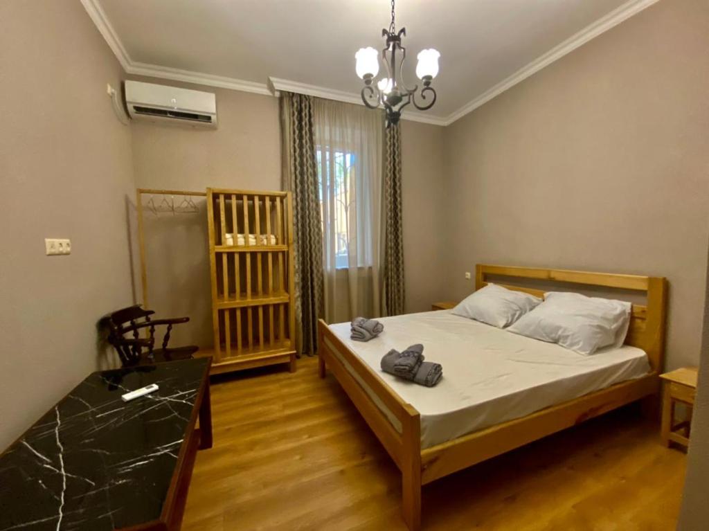 Llit o llits en una habitació de Guest House - Avlabari