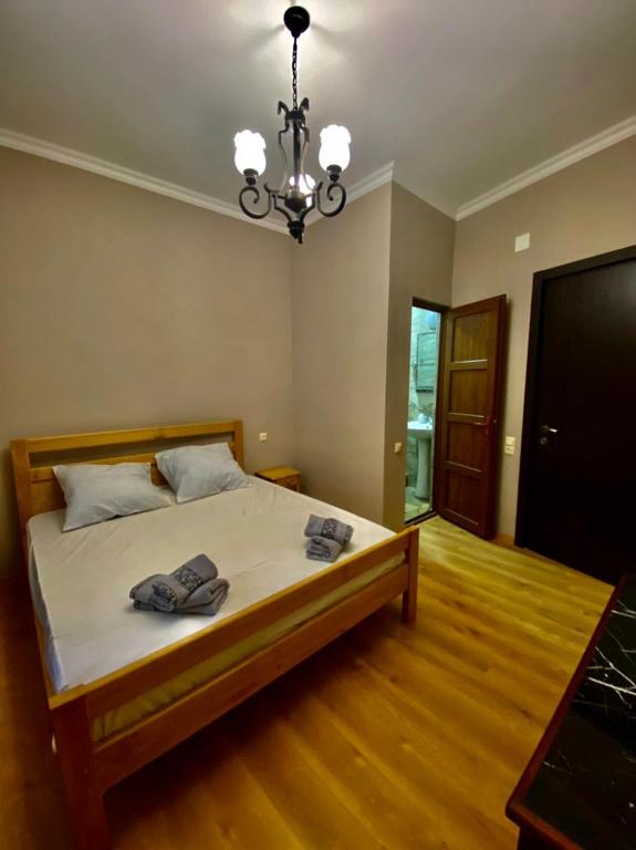 Llit o llits en una habitació de Guest House - Avlabari