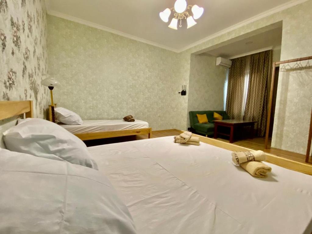 Llit o llits en una habitació de Guest House - Avlabari